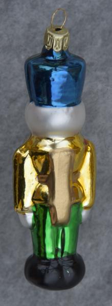 Nußknacker goldene Jacke, grüne Hose, blauer Hut